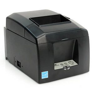 A black printer is sitting on the floor